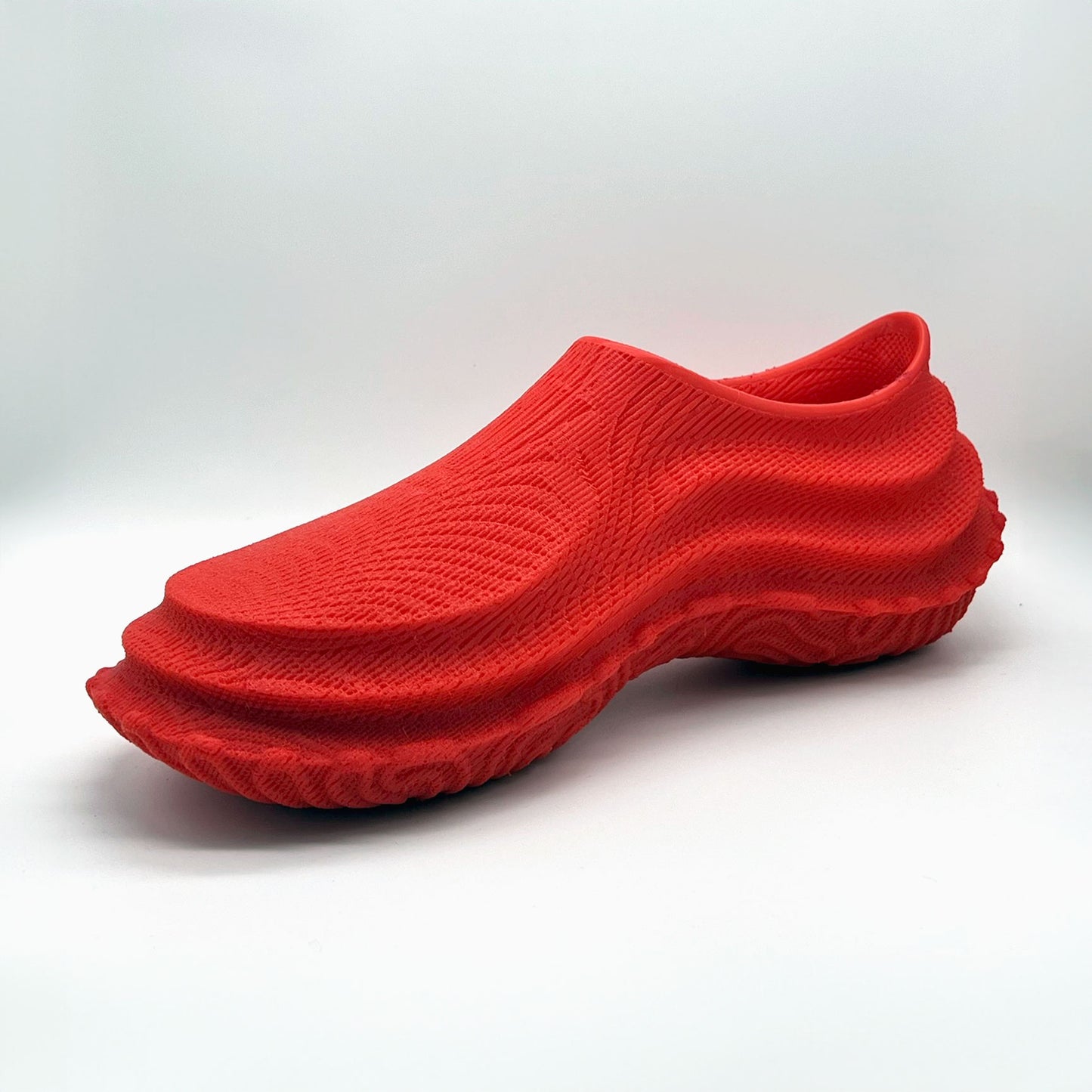 3D printed red pill shoes on 3/4 view